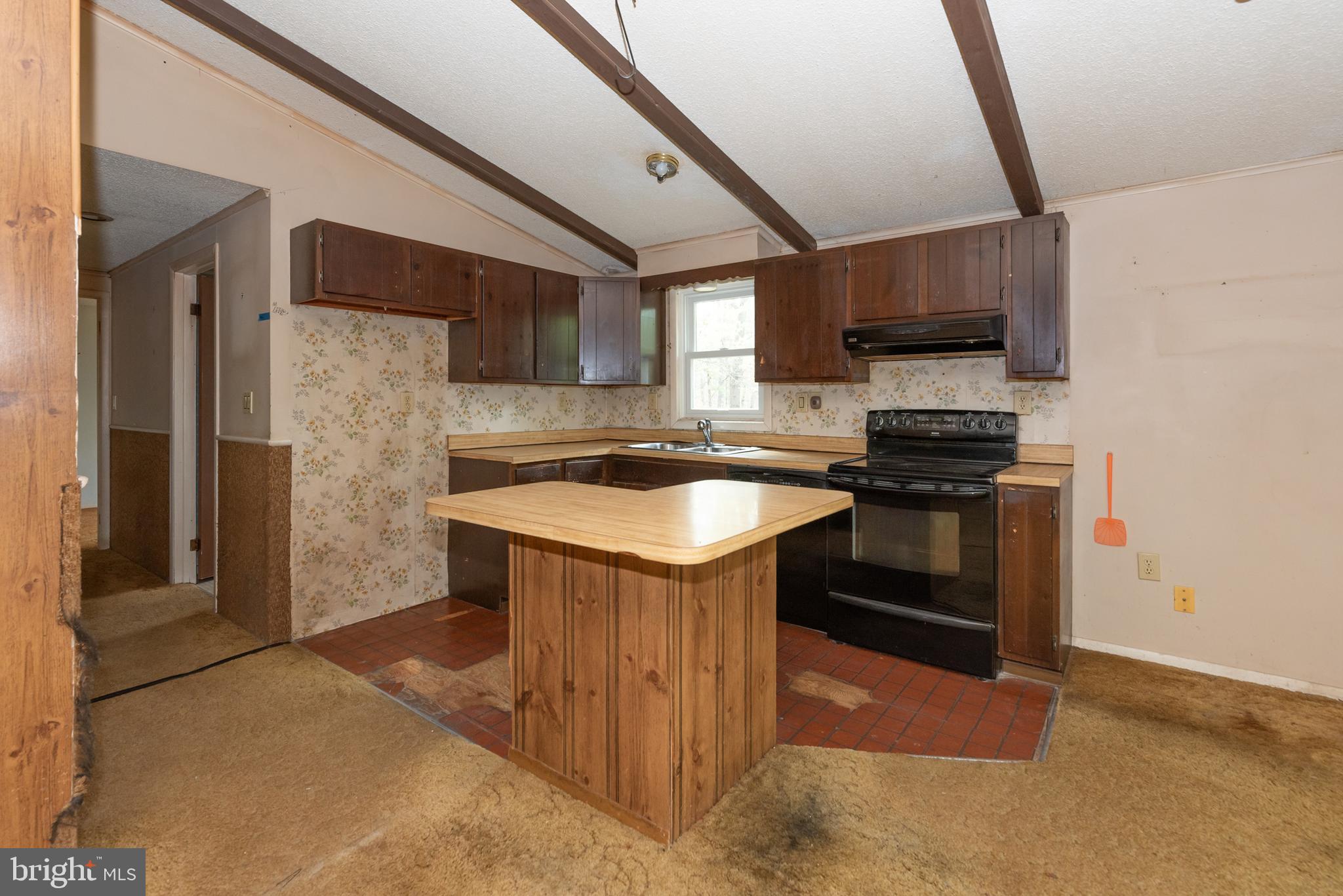 450 Weymouth Road Buena, NJ 08310 - Photo 32 of 48 a kitchen with stainless steel appliances granite countertop a sink stove and refrigerator