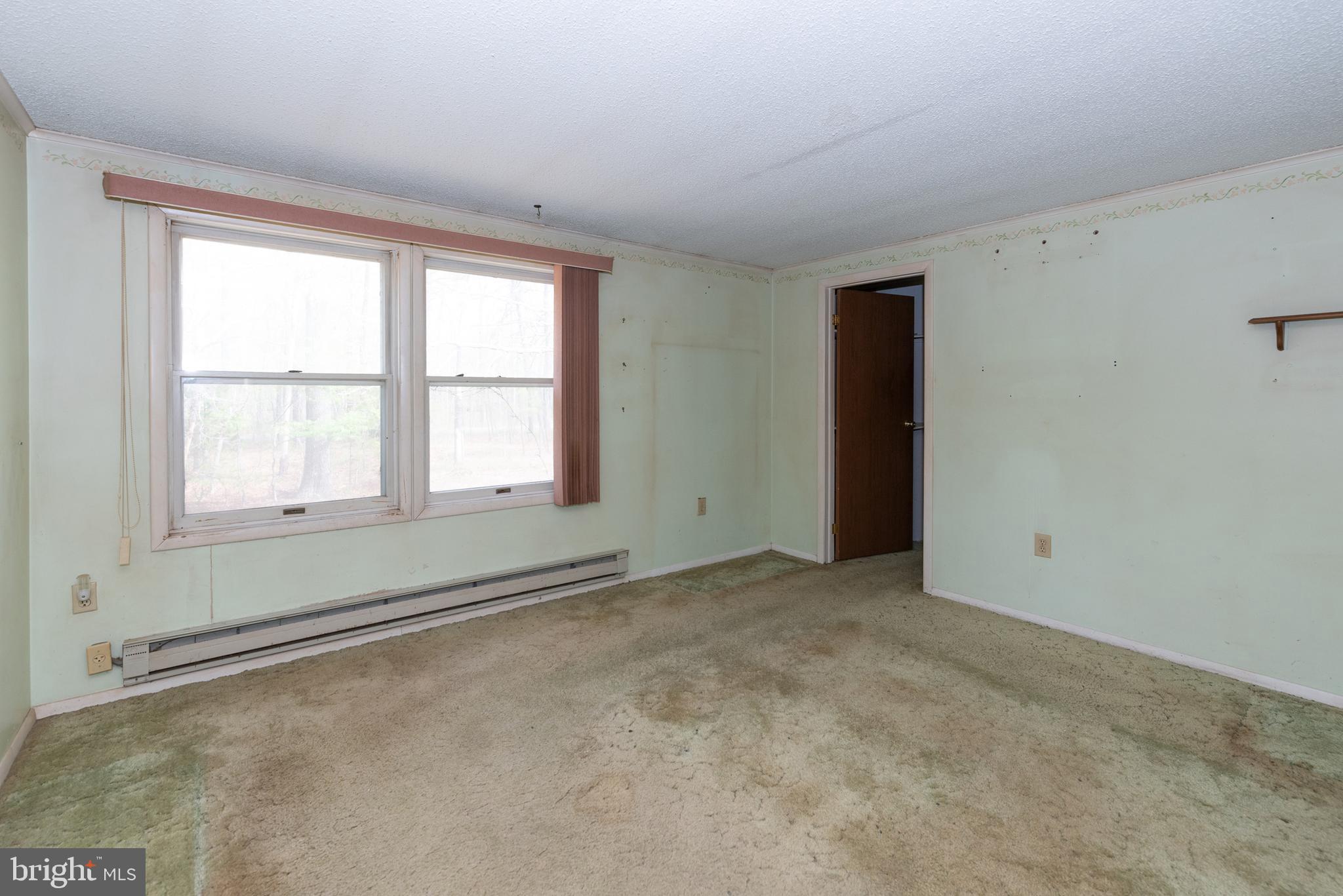 450 Weymouth Road Buena, NJ 08310 - Photo 34 of 48 a view of an empty room with a window
