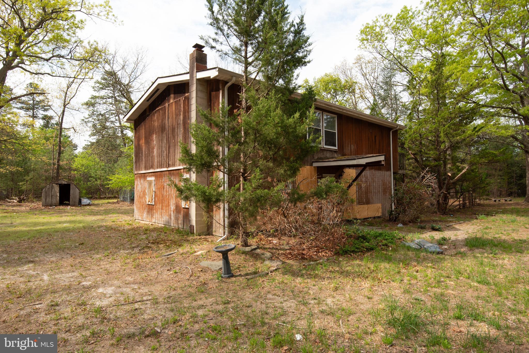 450 Weymouth Road Buena, NJ 08310 - Photo 4 of 48 a front view of a house with a yard