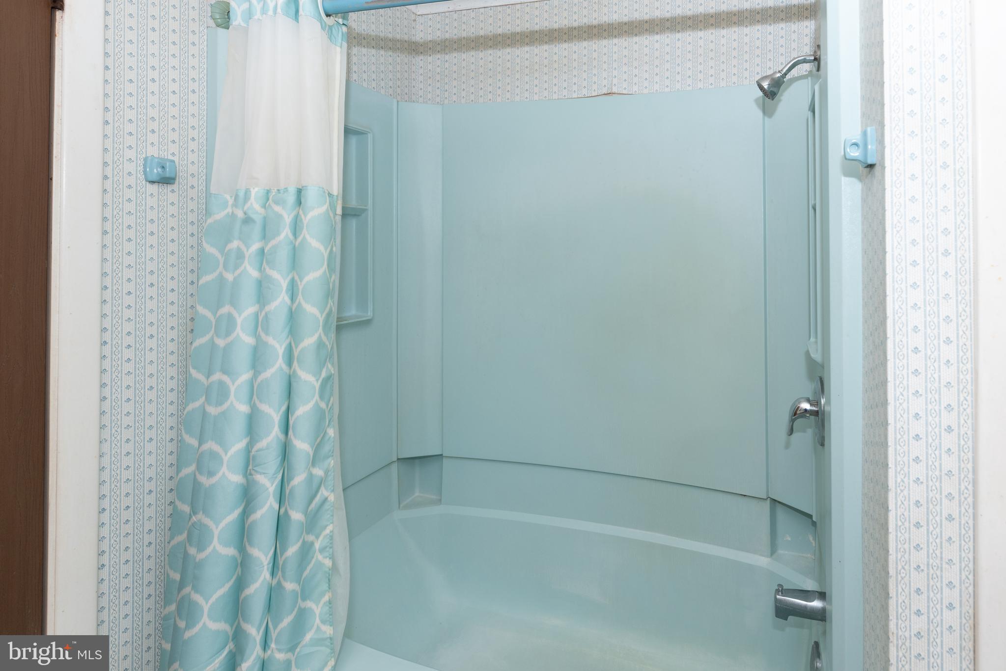 450 Weymouth Road Buena, NJ 08310 - Photo 48 of 48 a bathroom with a shower and a bathtub