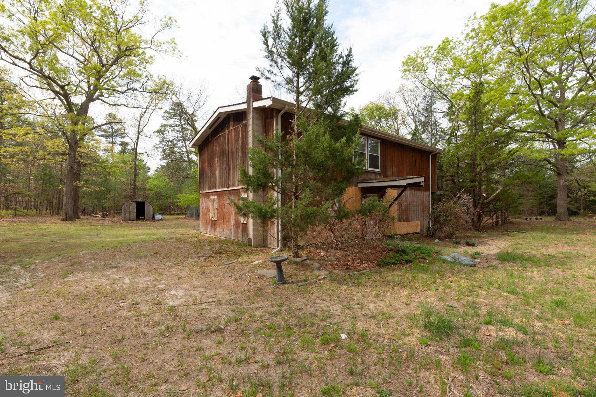 450 Weymouth Road Buena, NJ 08310 - Photo 5 of 48 a backyard of a house with lots of green space