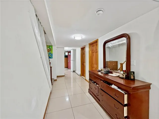 a room with furniture and a window