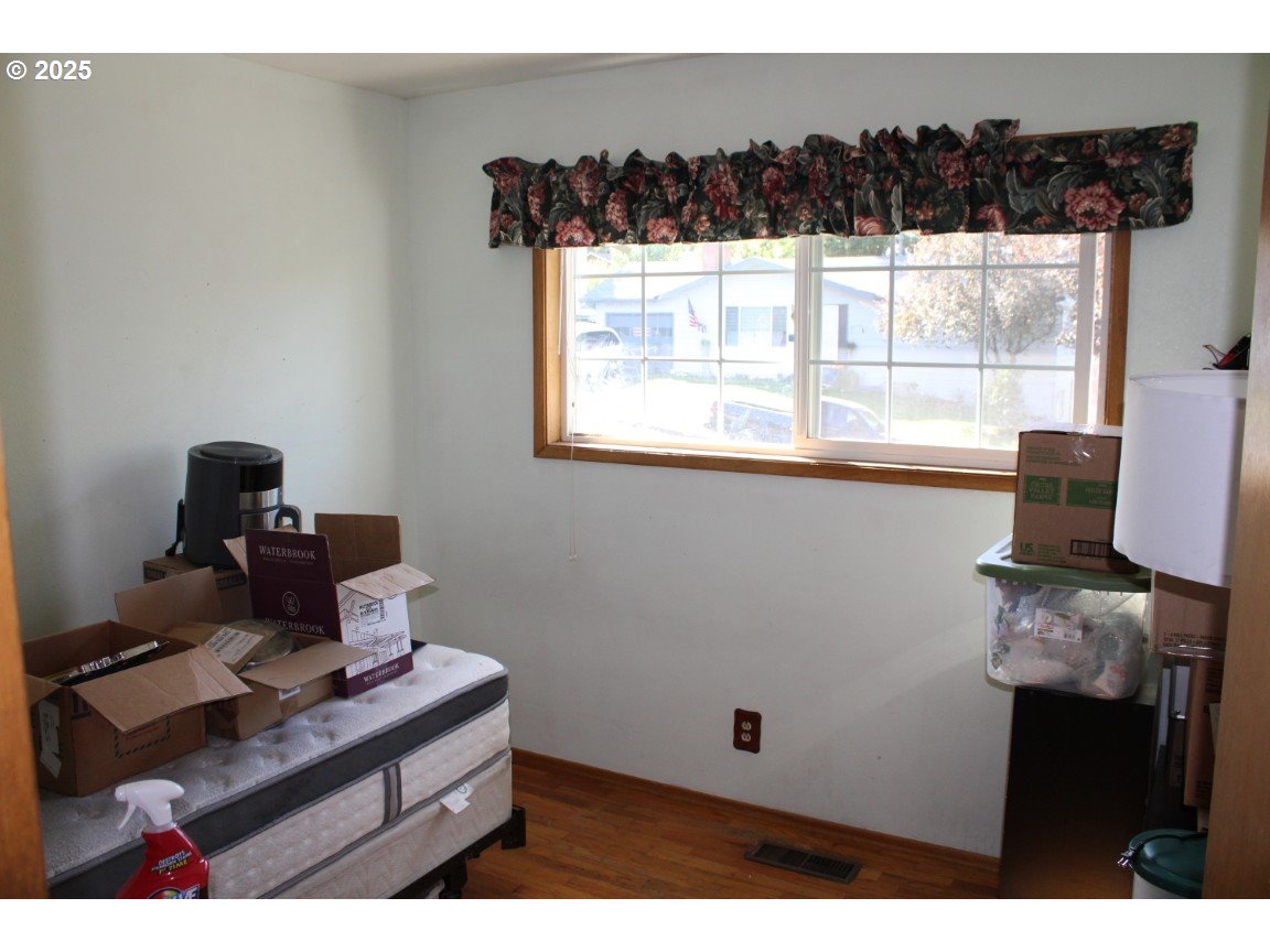 3307 Southwest Kirk Avenue Pendleton, OR 97801 - Photo 12 of 28 a living room with furniture and a window