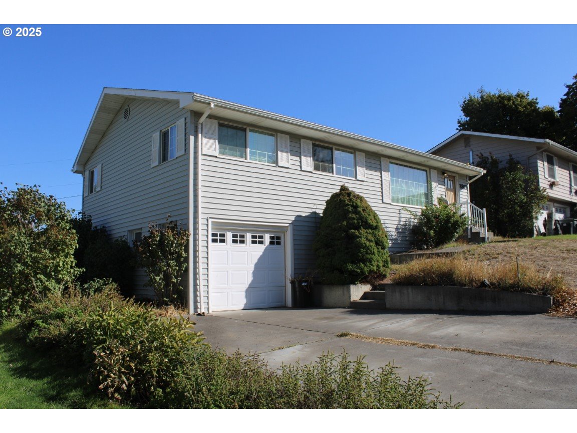3307 Southwest Kirk Avenue Pendleton, OR 97801 - Photo 2 of 28 a view of a house with a backyard