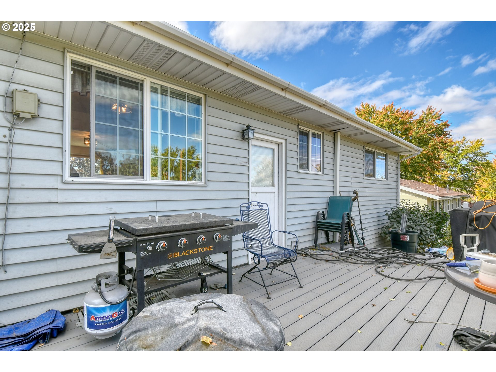 3307 Southwest Kirk Avenue Pendleton, OR 97801 - Photo 26 of 28 a view of a patio with table and chairs with wooden floor and fence