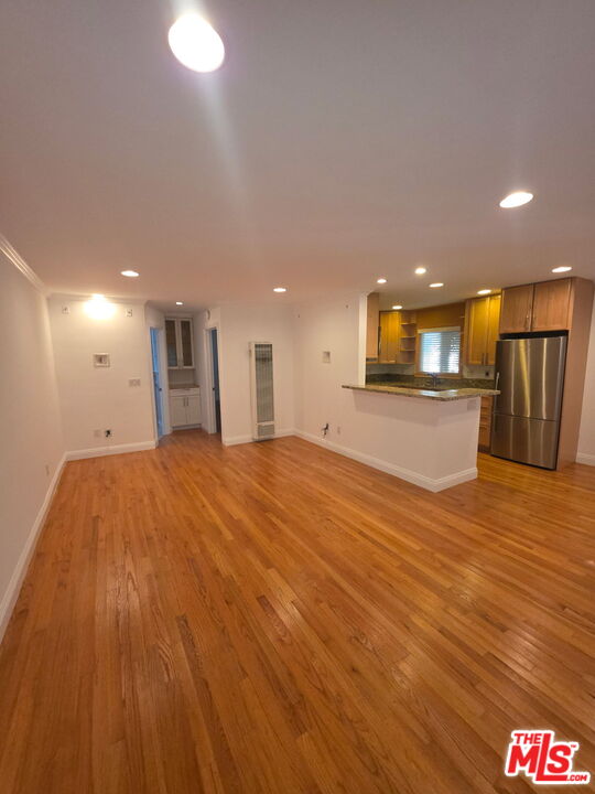 309 Broadway Street, Unit 6 Venice, CA 90291 - Photo 14 of 28 a view of a kitchen with a sink and a refrigerator