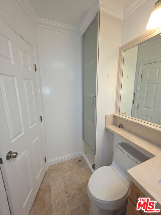 309 Broadway Street, Unit 6 Venice, CA 90291 - Photo 17 of 28 a white toilet sitting next to a bathroom sink
