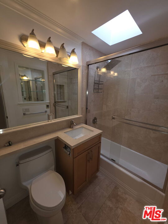 309 Broadway Street, Unit 6 Venice, CA 90291 - Photo 21 of 28 a bathroom with a sink a toilet and shower