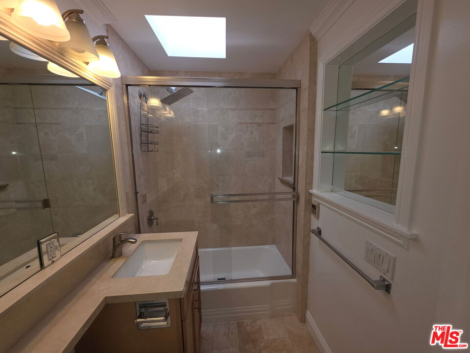 309 Broadway Street, Unit 6 Venice, CA 90291 - Photo 28 of 28 a bathroom with a sink a toilet and shower