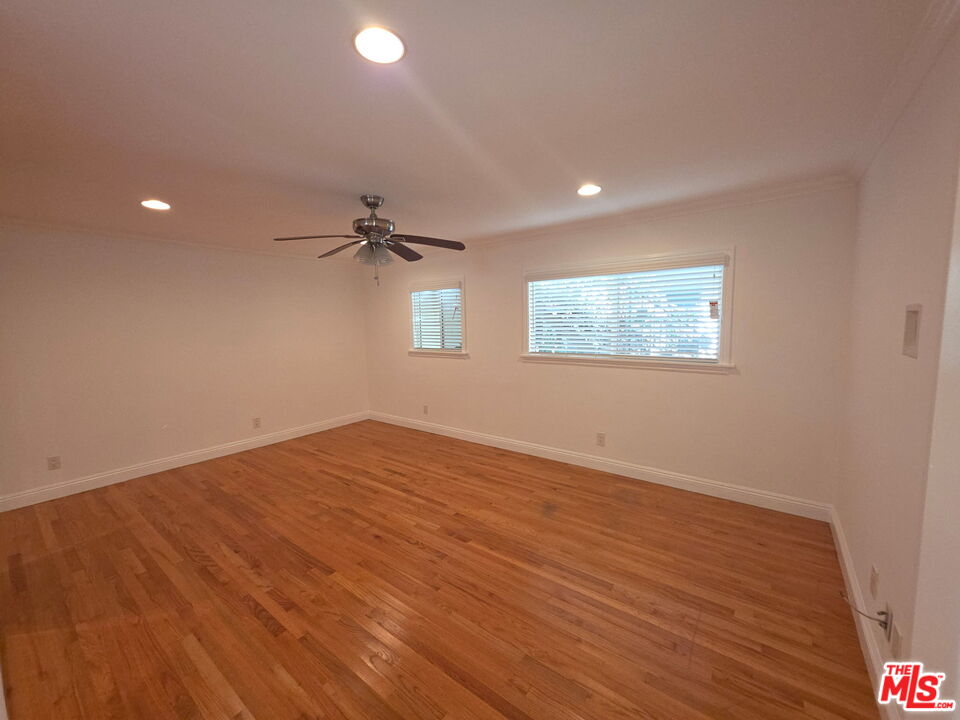 309 Broadway Street, Unit 6 Venice, CA 90291 - Photo 6 of 28 wooden floor in an empty room with a window
