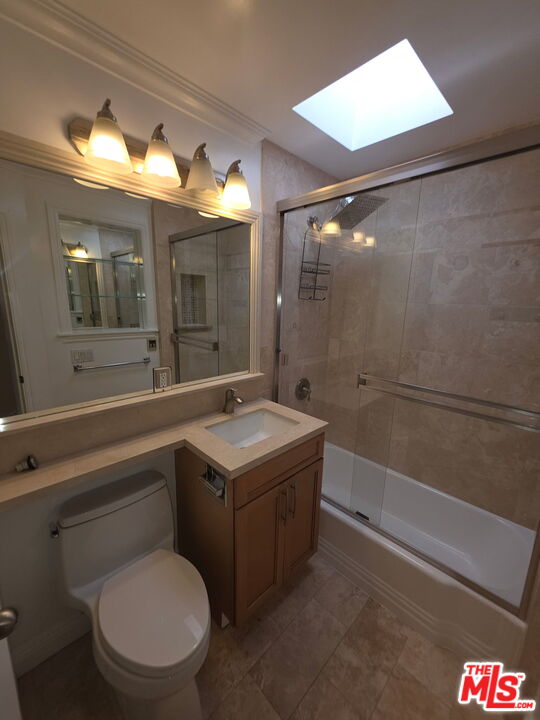 309 Broadway Street, Unit 6 Venice, CA 90291 - Photo 10 of 28 a bathroom with a sink a toilet and shower