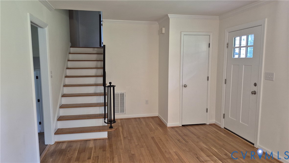 7818 River Road Petersburg, VA 23803 - Photo 4 of 19 Hardwood flooring extending throughout the space
