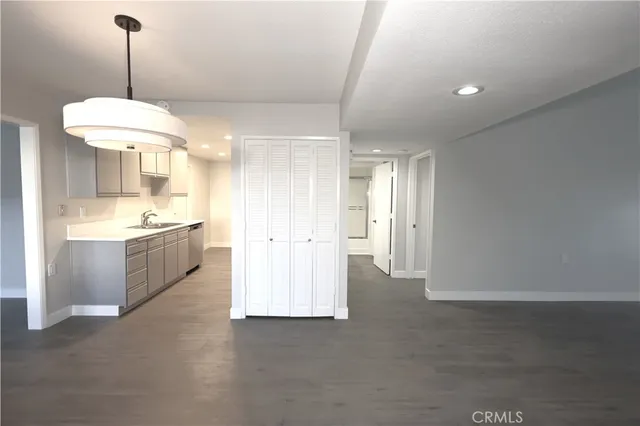 a view of a kitchen and a chandelier