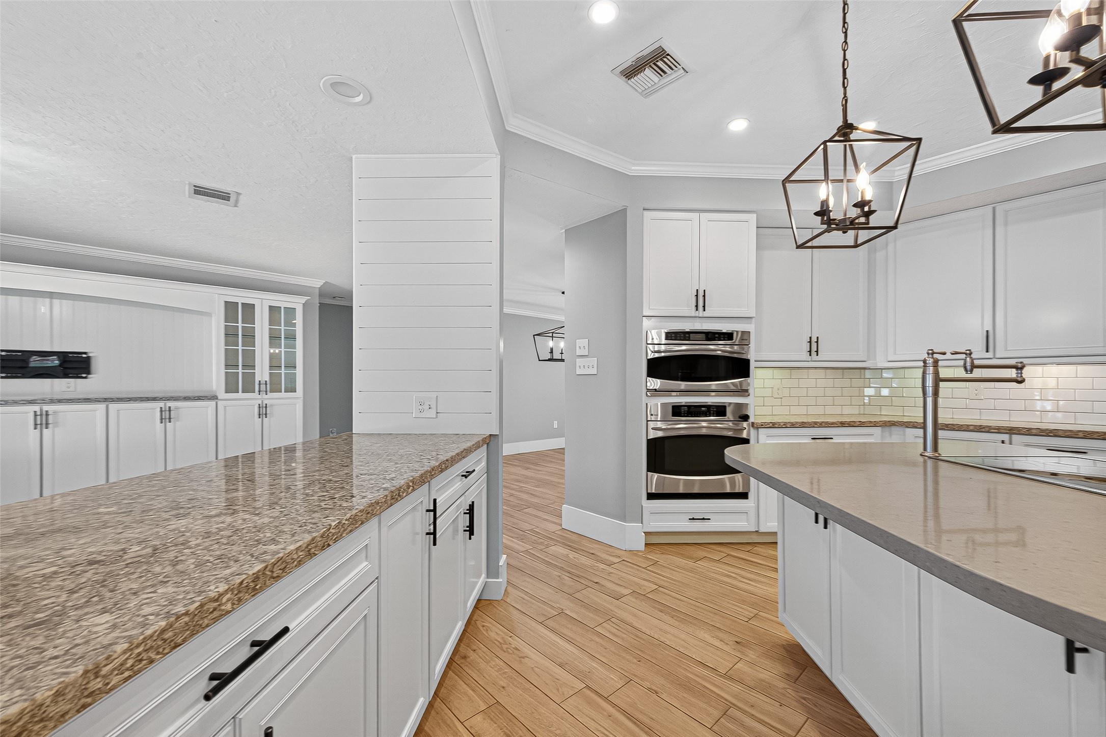 3115 Eula Morgan Road Katy, TX 77493 - Photo 14 of 36 a kitchen with stainless steel appliances granite countertop a stove and cabinets