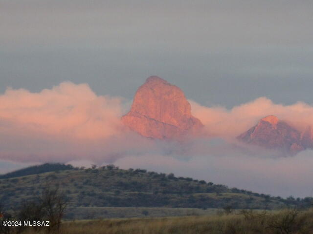 35700 South Cedar Creek Road Arivaca, AZ 85601 - Photo 13 of 44 a sunset view with mountains in the background