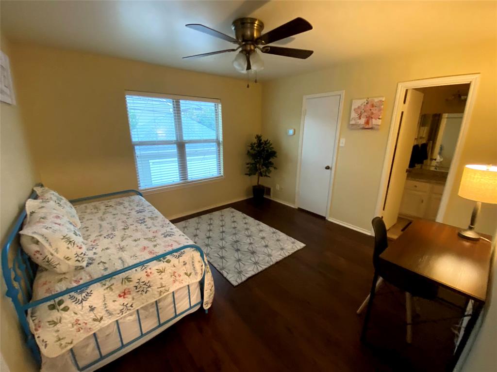 3325 Bristol Road Fort Worth, TX 76107 - Photo 25 of 26 a bedroom with a bed and a window