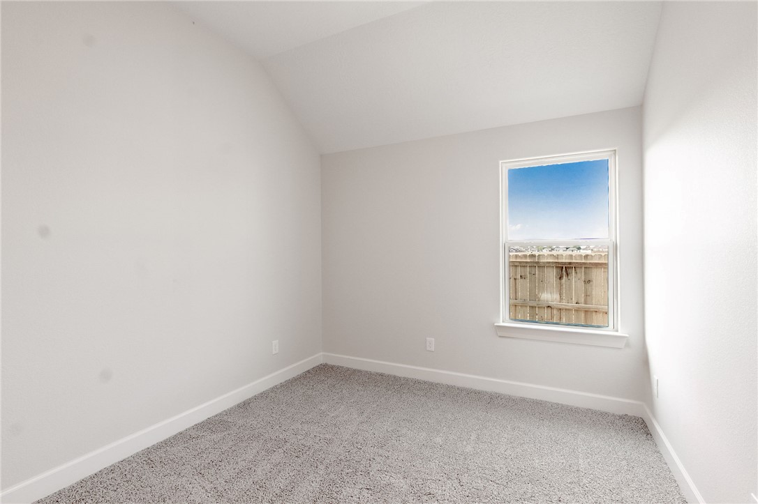 497 Combine Road Snook, TX 77879 - Photo 13 of 27 a view of an empty room with a window