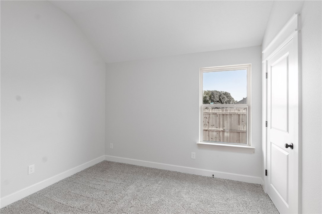 497 Combine Road Snook, TX 77879 - Photo 16 of 27 an empty room with a window