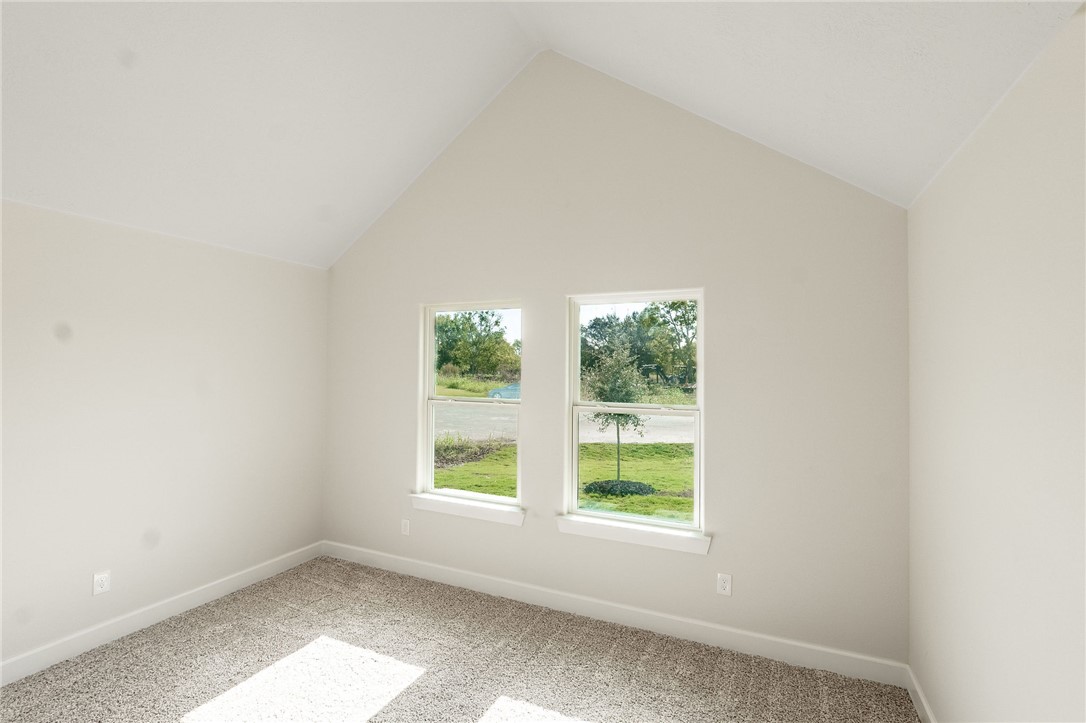 497 Combine Road Snook, TX 77879 - Photo 18 of 27 an empty room with windows