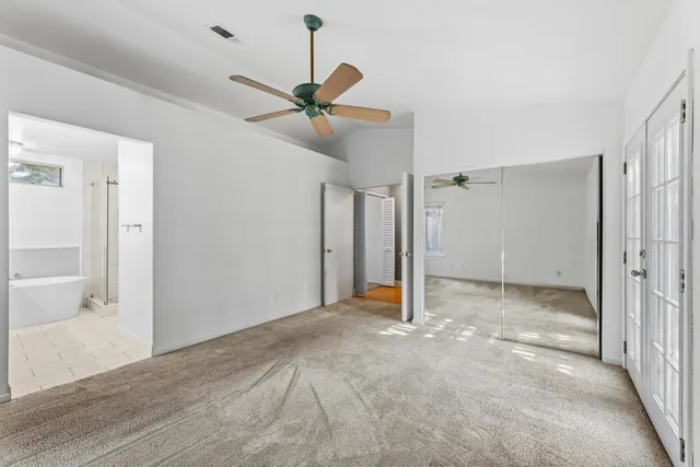 a bathroom with a double vanity sink mirror and double