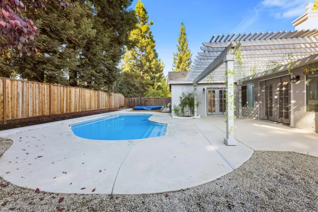 a view of balcony with wooden floor