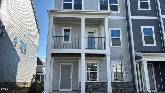 a building with a window and balcony