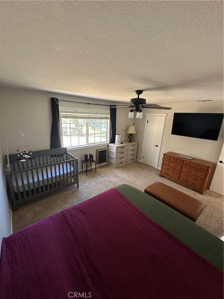 15609 Spunky Canyon Road Green Valley, CA 91390 - Photo 14 of 29 a living room with furniture and a wooden floor