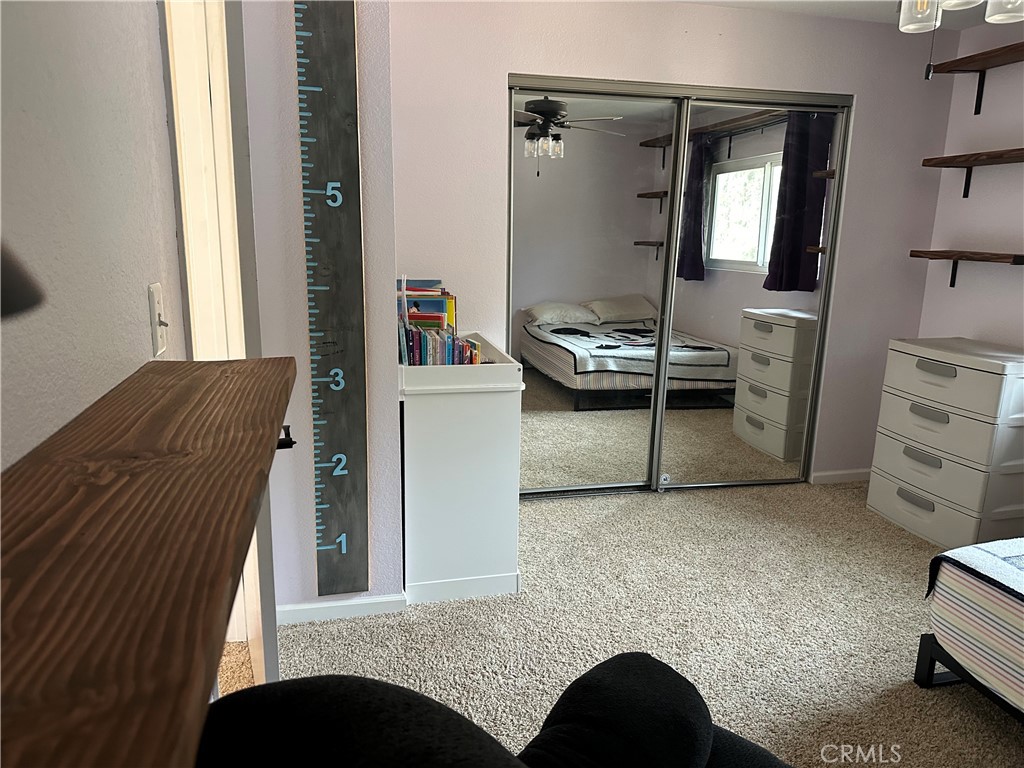 15609 Spunky Canyon Road Green Valley, CA 91390 - Photo 21 of 29 a living room with furniture and a window