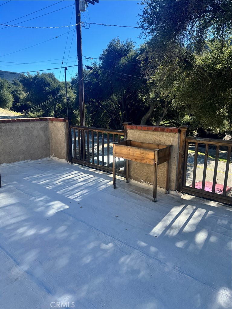 15609 Spunky Canyon Road Green Valley, CA 91390 - Photo 22 of 29 a view of backyard with a deck and mountain view