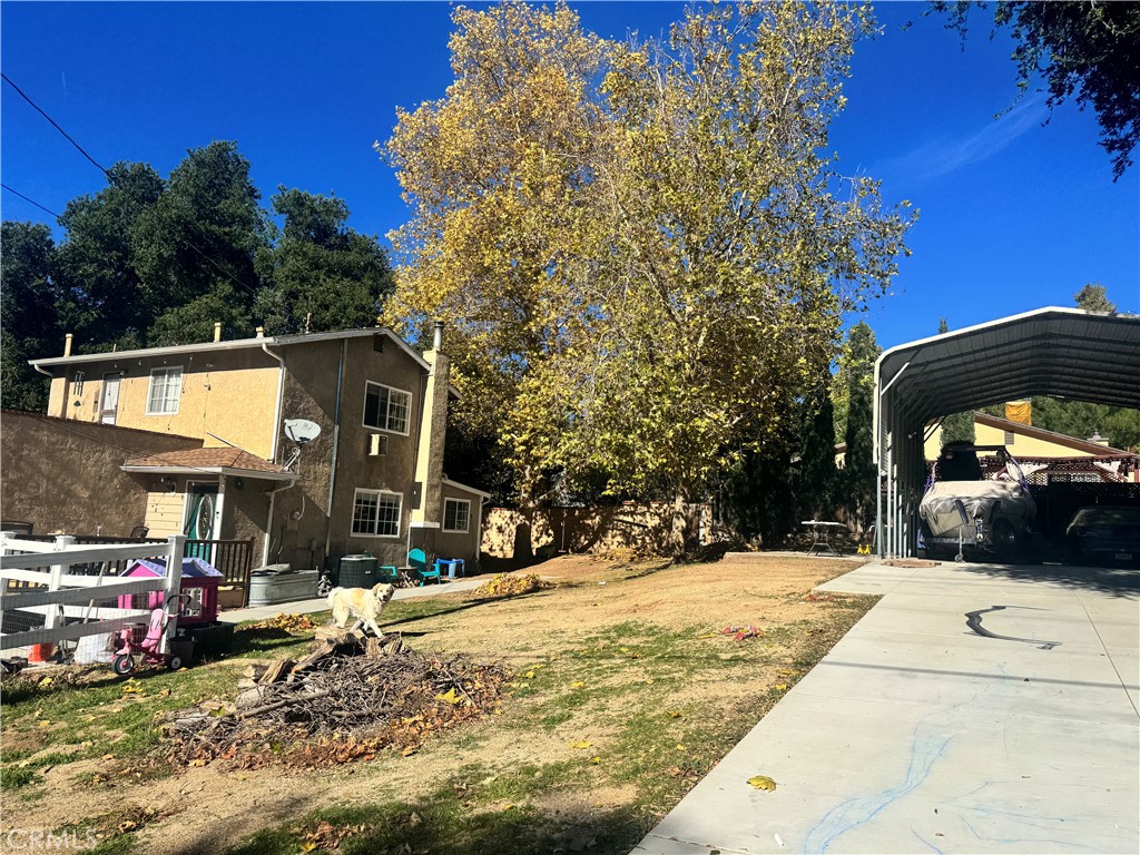 15609 Spunky Canyon Road Green Valley, CA 91390 - Photo 23 of 29 a view of outdoor space with car parked