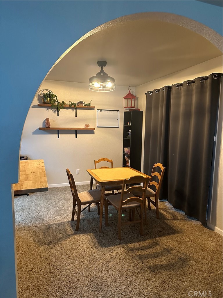 15609 Spunky Canyon Road Green Valley, CA 91390 - Photo 5 of 29 a view of a chairs and table in a backyard