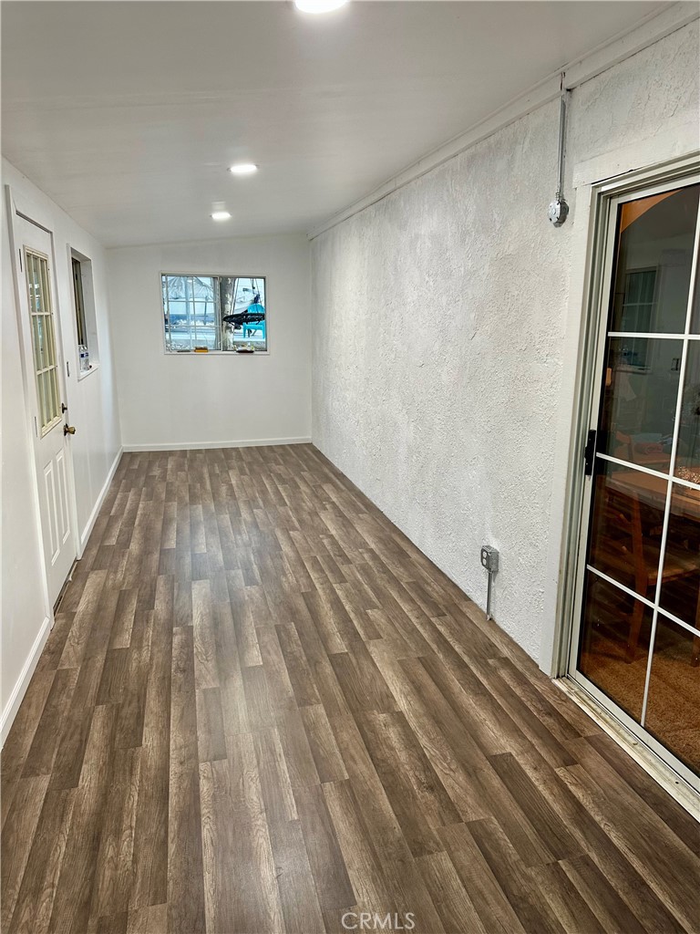 15609 Spunky Canyon Road Green Valley, CA 91390 - Photo 10 of 29 a view of an empty room and a window
