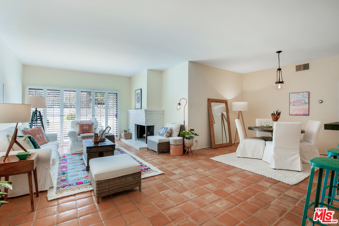 8180 Manitoba Street, Unit 124 Playa del Rey, CA 90293 - Photo 2 of 30 a living room with furniture and a wooden floor