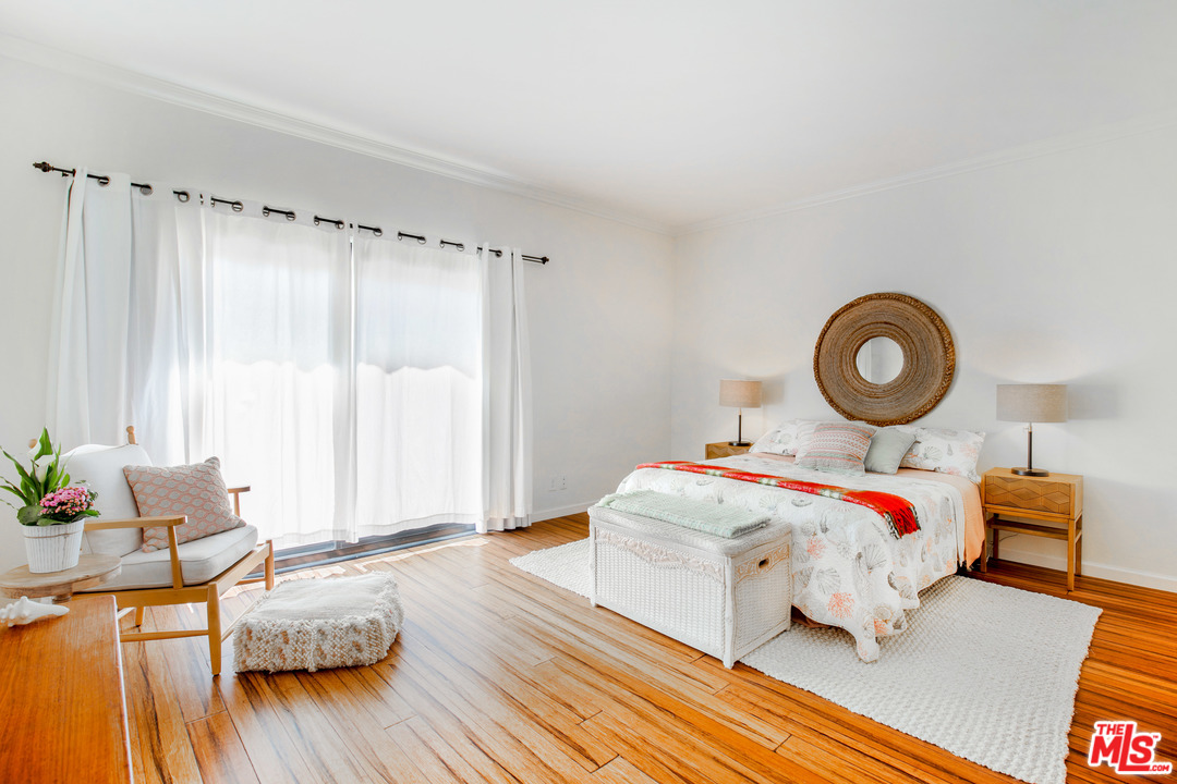 8180 Manitoba Street, Unit 124 Playa del Rey, CA 90293 - Photo 3 of 30 a bedroom with a bed and a window