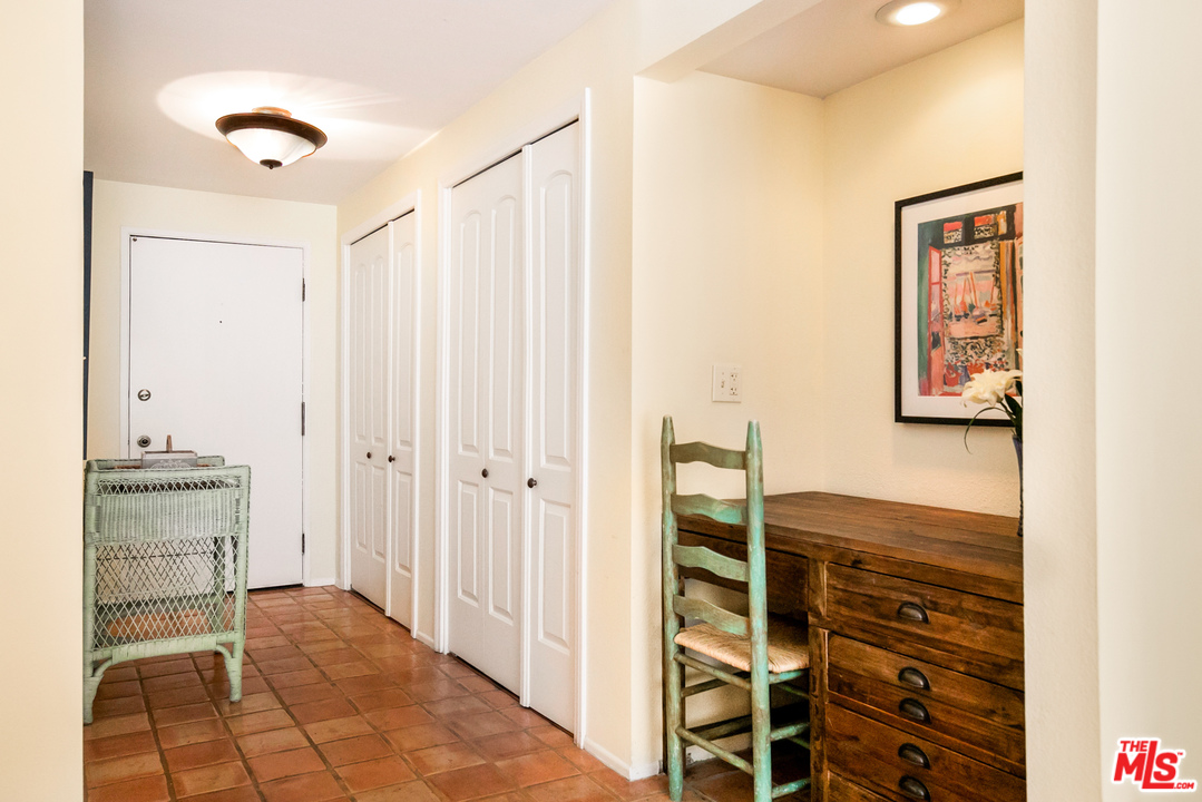 8180 Manitoba Street, Unit 124 Playa del Rey, CA 90293 - Photo 21 of 30 a view of walk in closet with chandelier