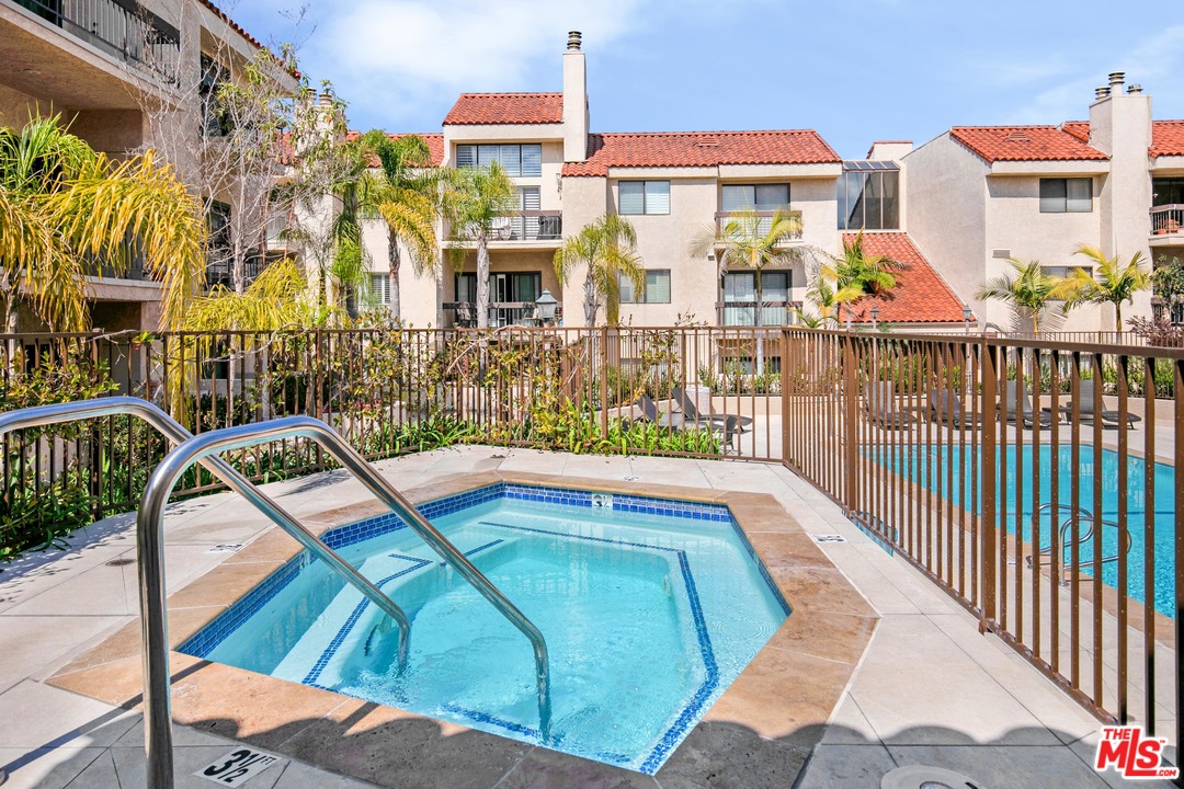 8180 Manitoba Street, Unit 124 Playa del Rey, CA 90293 - Photo 27 of 30 a view of a swimming pool with a patio