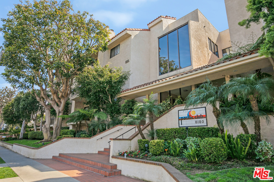 8180 Manitoba Street, Unit 124 Playa del Rey, CA 90293 - Photo 4 of 30 a street sign on a pole on a street