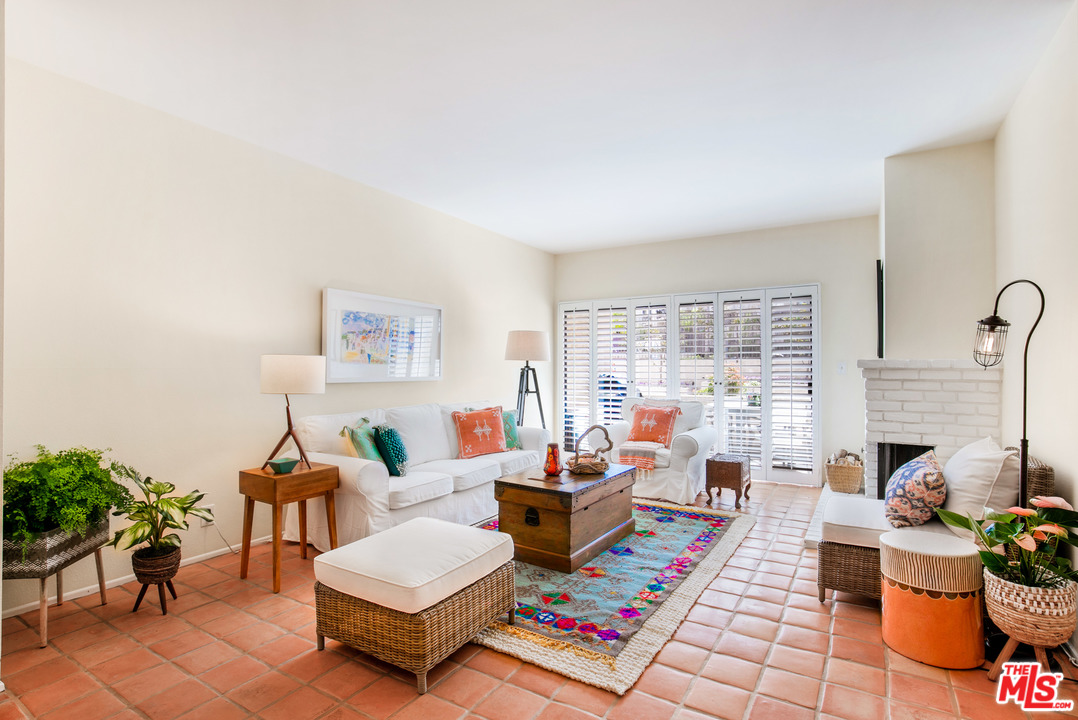 8180 Manitoba Street, Unit 124 Playa del Rey, CA 90293 - Photo 7 of 30 a living room with furniture and a potted plant
