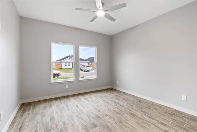 a living room with stainless steel appliances kitchen island furniture and a kitchen view