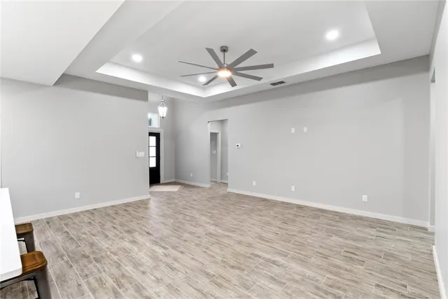 a kitchen with a table and chairs in it