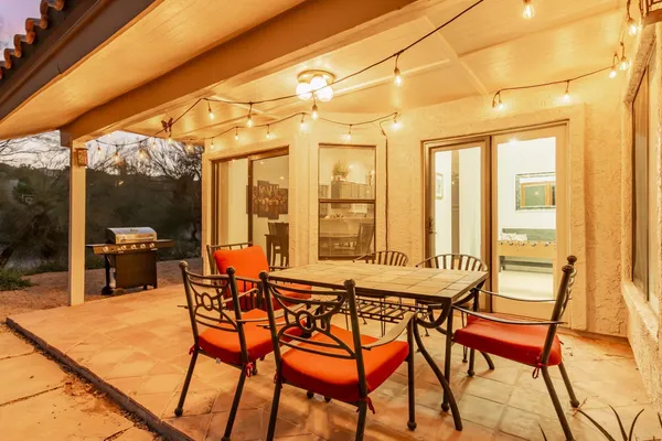 a view of an outdoor space with furniture