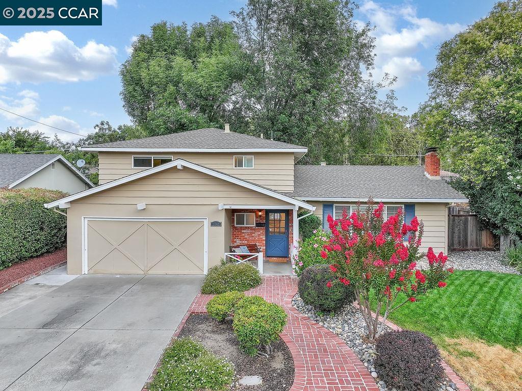 1849 Taft Street Concord, CA 94521 - Photo 1 of 1 a front view of a house with garden