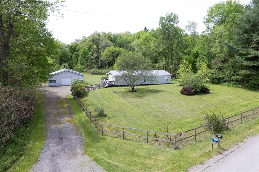 9133 South Watson Run Road Meadville, PA 16335 - Photo 45 of 45 a swimming pool with some trees in the background