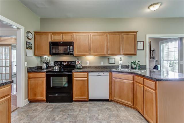 1928 Portway Road Spring Hill, TN 37174 - Photo 8 of 16 The kitchen provides wonderful workspace and plenty of cabinets.