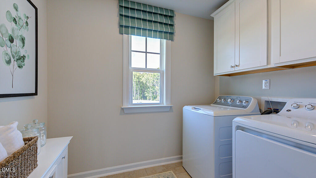 151 Rivulet Court Cary, NC 27519 - Photo 36 of 37 a utility room with dryer and washer