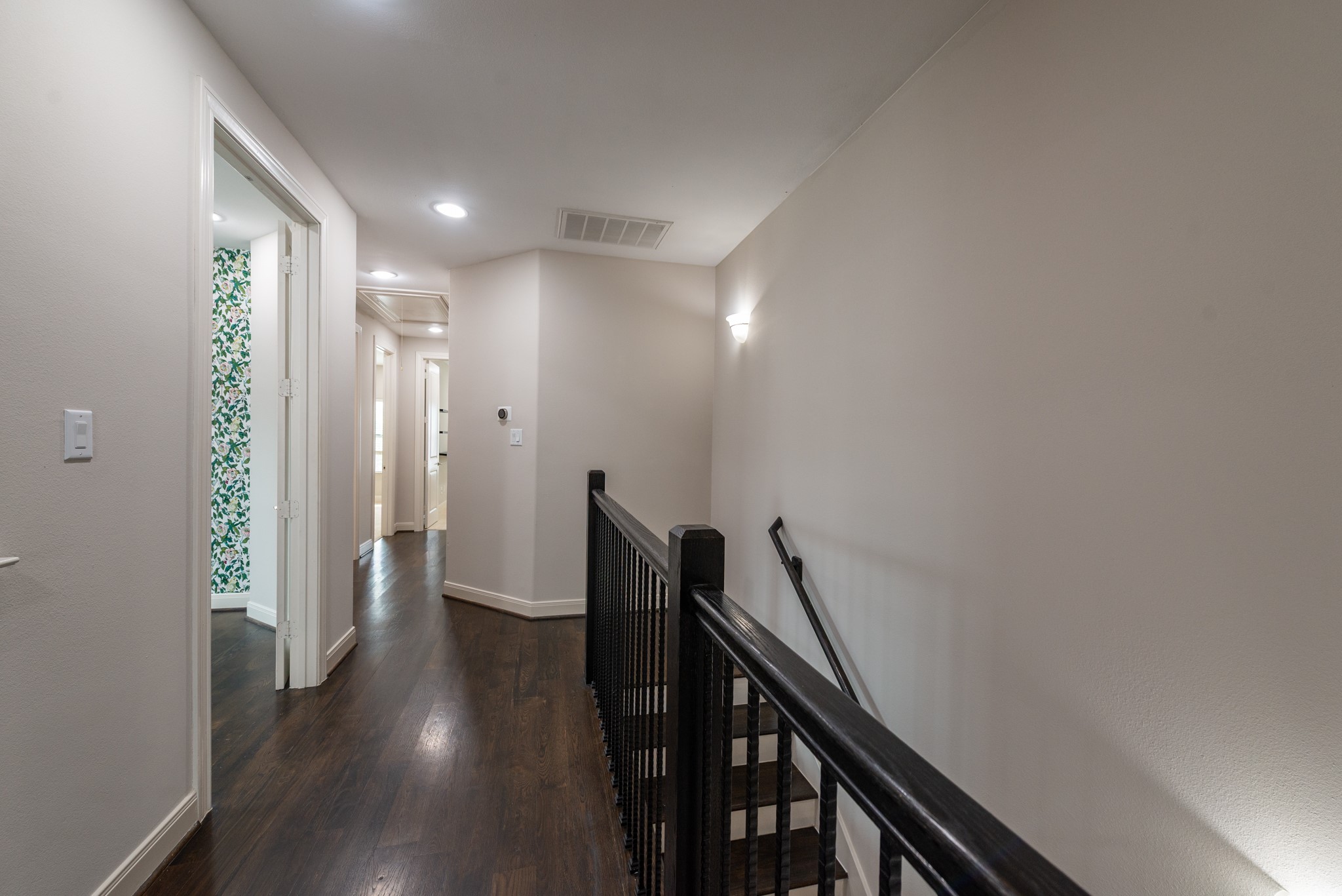 3504 Chenevert Street, Unit A Houston, TX 77004 - Photo 12 of 33 a view of a hallway with wooden floor