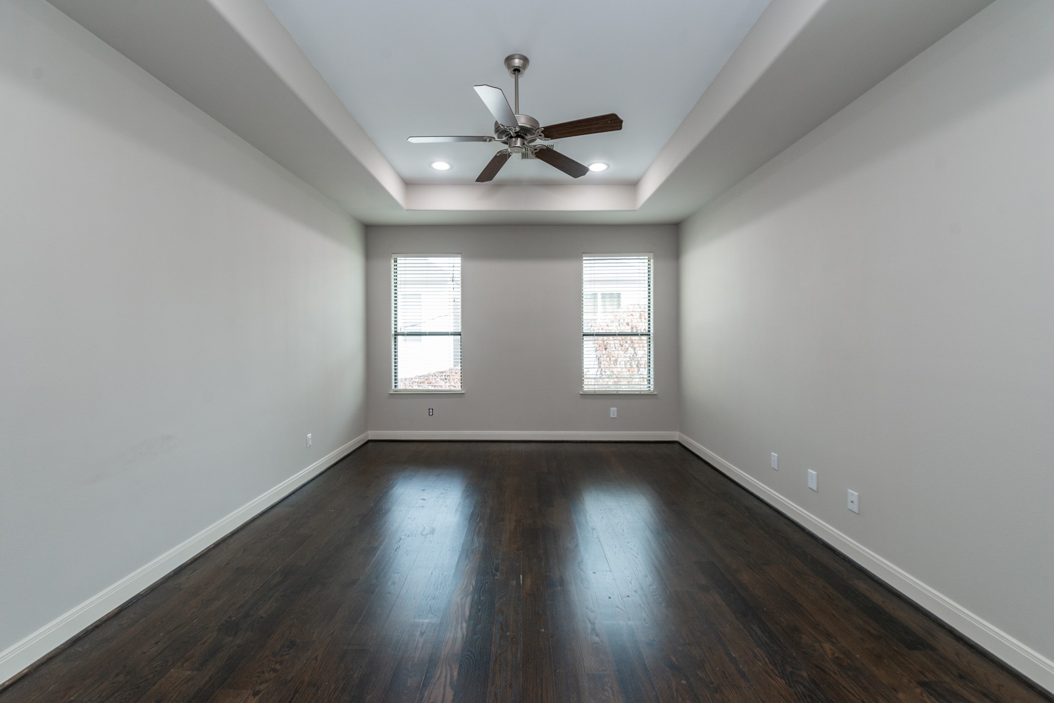 3504 Chenevert Street, Unit A Houston, TX 77004 - Photo 13 of 33 wooden floor in an empty room with a window