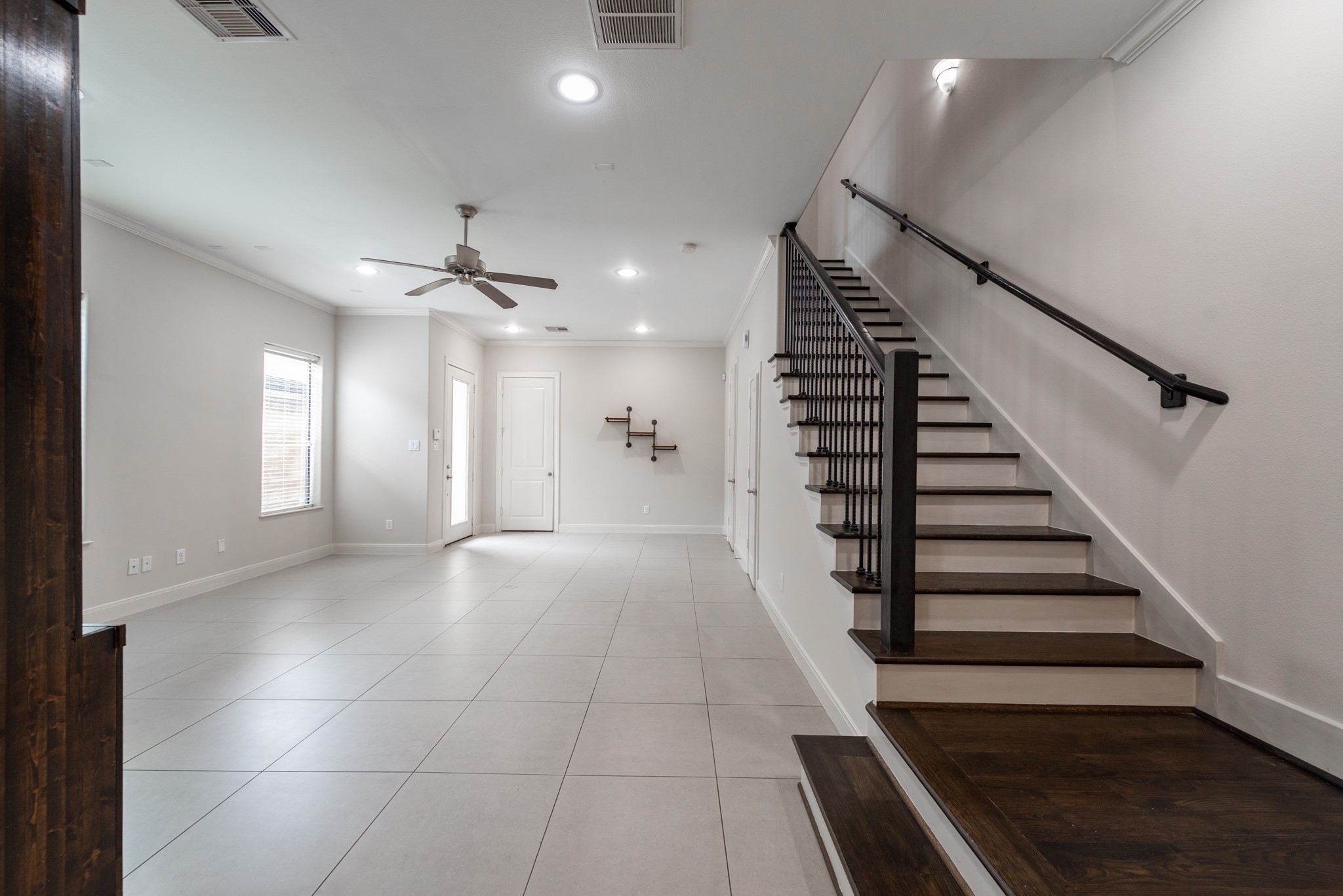 3504 Chenevert Street, Unit A Houston, TX 77004 - Photo 4 of 33 a view of entryway and hall with wooden floor