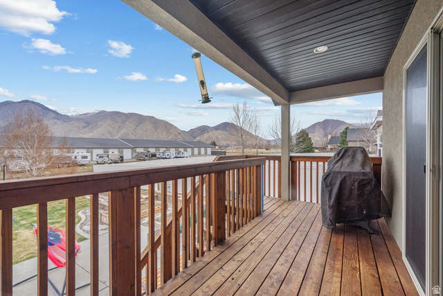 1896 West 800 North Mapleton, UT 84663 - Photo 41 of 55 Wooden deck with a mountain view, a grill, and a residential view