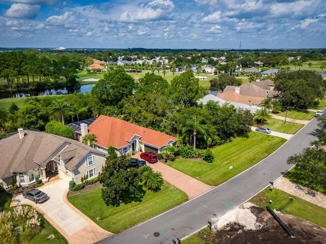 an aerial view of a house with a garden